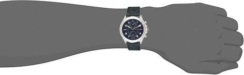 tommy hilfiger black strap watch with silver and blue dial on wrist
